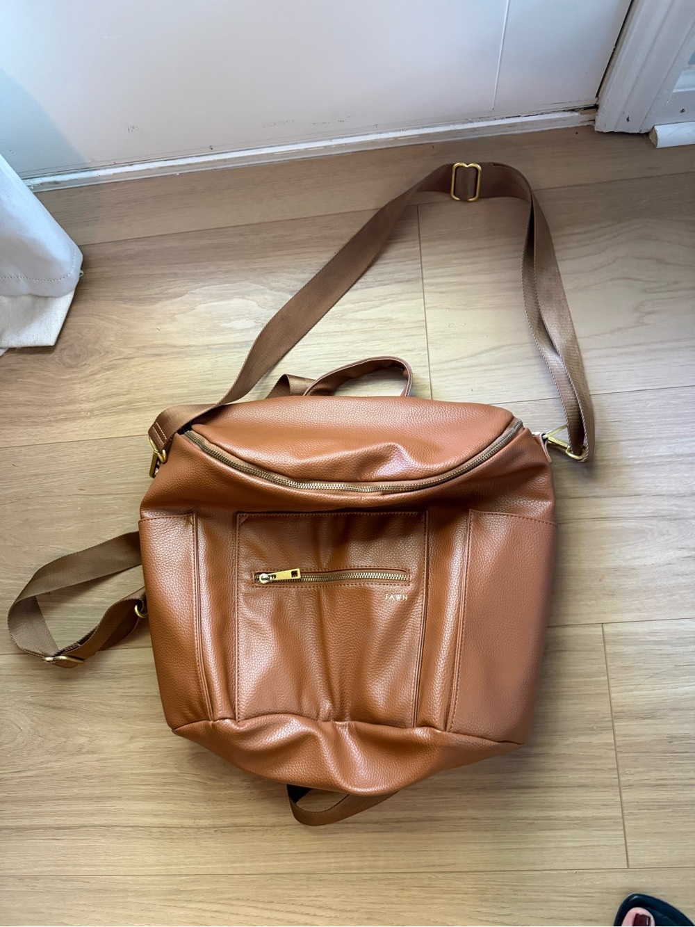 Convertible Tan Baby Bag Backpack with Front Zip Pocket